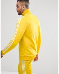 adidas beckenbauer track top yellow