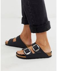Birkenstock Leder – Arizona – Flache, schwarze Sandalen mit großen  Schnallen in Schwarz | Lyst DE