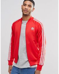 red and white adidas original jacket