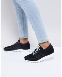 lyst adidas originali los angeles formatori in nero in nero per gli uomini. lyst adidas originali los angeles formatori in nero in nero per gli uomini.