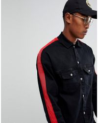 denim jacket with red stripe