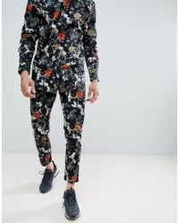 Pantalones de vestir con estampado de flores de BoohooMAN de hombre de  color Negro | Lyst