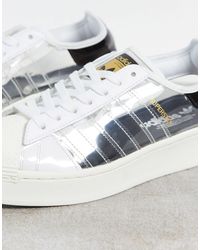 Zapatillas llamativas con paneles transparentes en blanco superstar adidas  Originals | Lyst