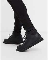 Botas bajas en negro Newmarket Arch Timberland de Lona de color Negro para  hombre | Lyst