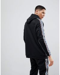 nike half zip hoodie with taped side stripe