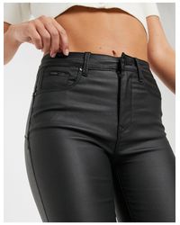Stradivarius Denim Push-up Jeans Met Coating in het Zwart | Lyst NL