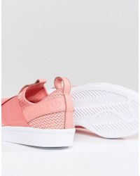 adidas slip on orange