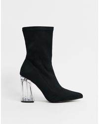 Botas tipo calcetín en punta color negro con tacón transparente Truffle  Collection de color Negro | Lyst