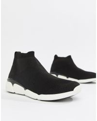 Zapatillas de deporte estilo calcetn negras con suelas gruesas de ALDO de  Cuero de color Negro | Lyst