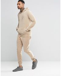 beige tracksuit men