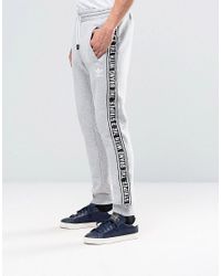 adidas the brand with the 3 stripes joggers