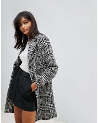 oasis check coat