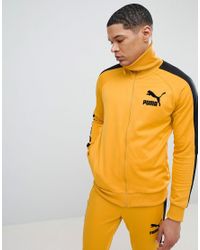 puma tracksuit gold