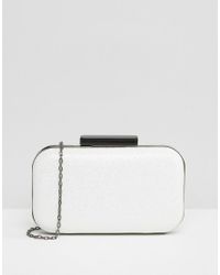 white glitter clutch bag