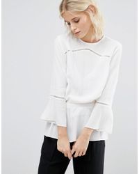 white blouse with elastic waist