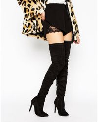truffle collection thigh high heeled boots in black