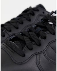 nike black gold trainers