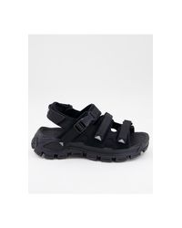 caterpillar flip flops mens