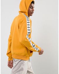 adidas yellow tnt tape hoodie