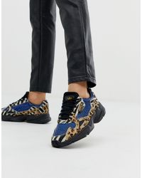 adidas Originals Leer Falcon - Sneakers Met Contrasterende Luipaardprint in  het Blauw - Lyst