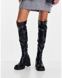 essence over the knee stretch boot