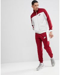 nike poly tracksuits