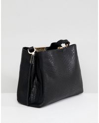 dune dinidarrow black cross body bag