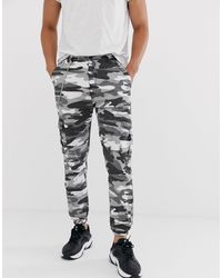 Pantalones carrot cargo con cadena en negro Bershka de Denim de color Negro  para hombre | Lyst