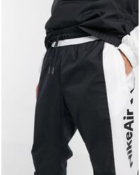 nike air cuffed joggers in black