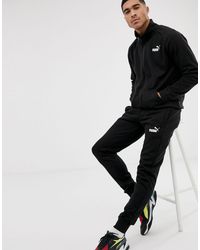 puma furry slides black