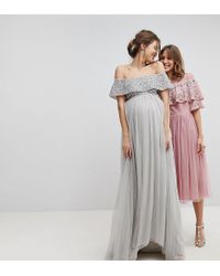 maya bardot sequin top tulle detail dress with high low hem
