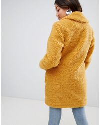 yellow teddy coat
