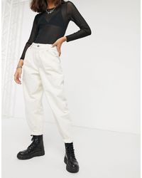 Pantaloni larghi con pieghe écruBershka in Denim di colore Bianco | Lyst