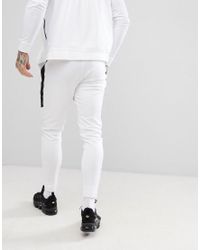 Nike Tribute Joggers In White 861652-100 for Men - Lyst