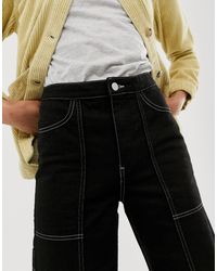 Pantaloni neri con cuciture a contrastoWeekday in Denim di colore Nero |  Lyst
