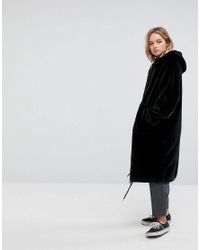 monki faux fur zip hooded coat in black