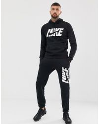 nike graphic tracksuit set