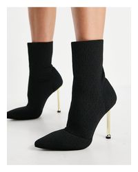 Botas negras estilo calcetín con tacón dorado shae SIMMI Shoes de color  Negro | Lyst