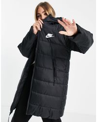 Chaqueta larga negra acolchada clásica con capucha Nike de color Negro |  Lyst