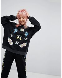 Felpa con stampa di uccelli e rose di Wildfox in Black