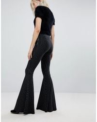 flared pinstripe trousers