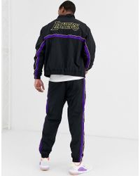 Basketball - LA Lakers NBA - Tuta sportiva nera e violaNike in Materiale  sintetico da Uomo colore Nero | Lyst