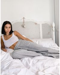 nike mini swoosh high waisted wide leg joggers in grey