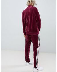 Pantalon de jogging en velours adidas Originals pour homme en coloris Rouge  - Lyst