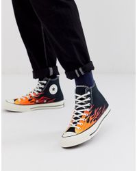 black fur converse