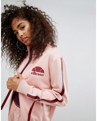 Top de survêtement avec liens à tirer sur les côtés Ellesse en coloris Pink