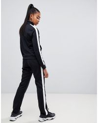 nike tracksuit with stripe