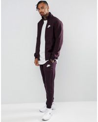 purple nike tracksuit