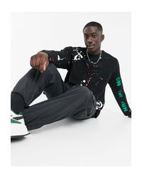 Maglione oversize con stampa graffiti da Uomo di Bershka in Nero | Lyst