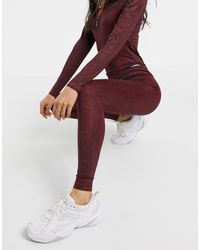 nike red snakeskin leggings
